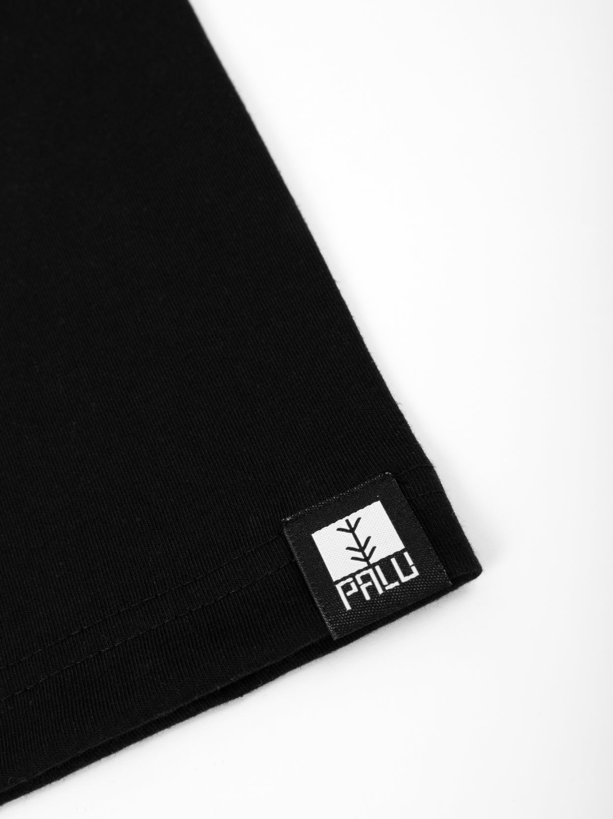 Black travel tee tag