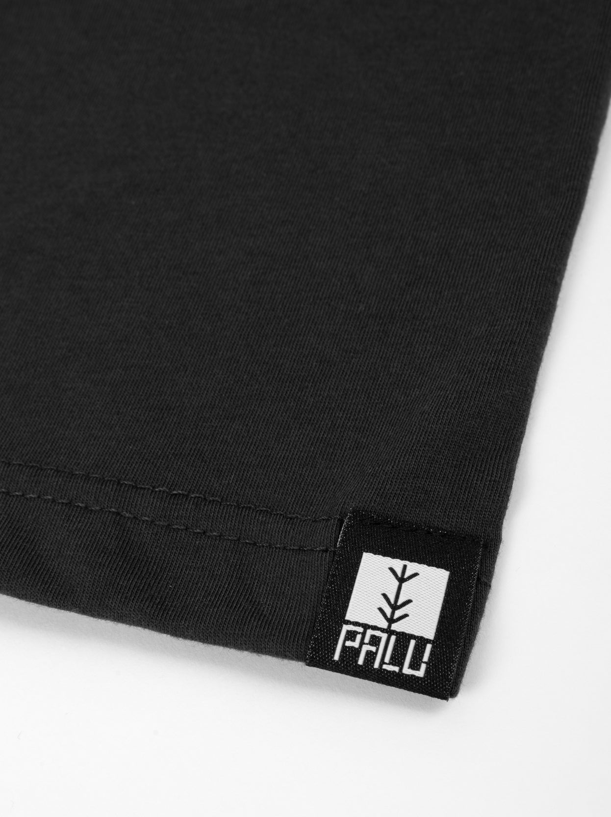 dark grey tree tee tag