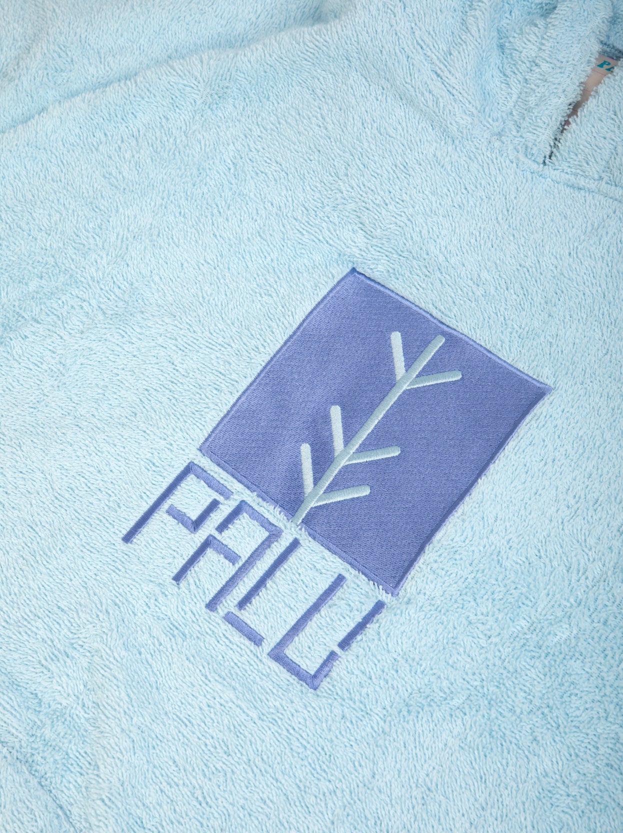 blue poncho logo