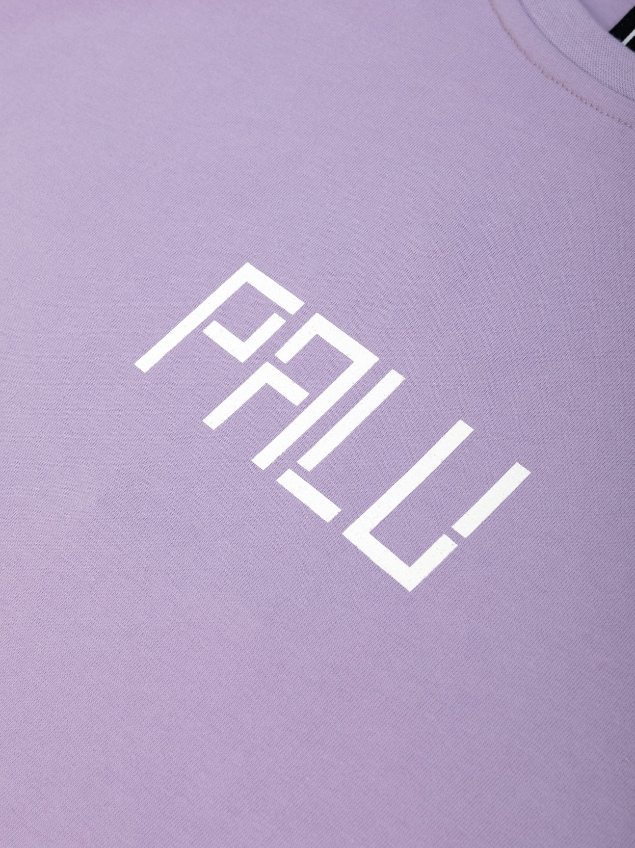 Lilac Travel Tee logo